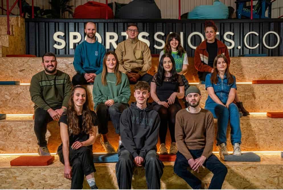 Team expansion - Head of marketing Dan Cartner (middle row far left) welcomes the newest members of SportsShoes.com's marketing social media and design team.
