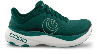 Lightweight teal running shoe with cushioned sole and logo design, ideal for running and training.