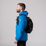 Lightweight men's running and hiking jacket with waterproof fabric and ventilation for outdoor sports. Perfect for trail running, trekking, and adventure activities.