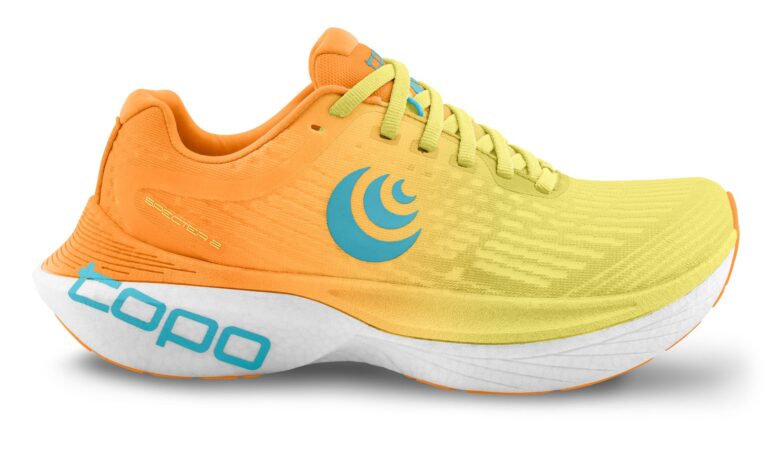 Vibrant orange and yellow running shoe with blue logo, lightweight design, and advanced sole technology for optimal performance. Ideal for marathon runners and sports enthusiasts.