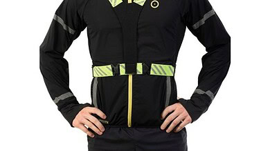 High-visibility running vest, reflective gear for runners, safety running jacket with bright accents, outdoor running apparel for night or early morning, breathable running equipment for endurance training.