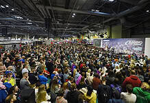 Vast crowd attending the Running Insights stage at the Birmingham Running Show, with speakers and presentations, dedicated to running enthusiasts and empowering runners with expert insights and the latest nutrition tips.