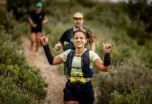 Running insights, marathon training, trail running, female athlete, endurance running, outdoor running, race day, sports performance, running event, fitness training, marathon runners, trail marathon, running gear, athletic women, fitness motivation.