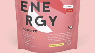 Pink Innermost Energy Booster vegan supplement pouch with BCAA, gluten-free, low sugar, and lactose-free, designed to support race preparation and recovery.