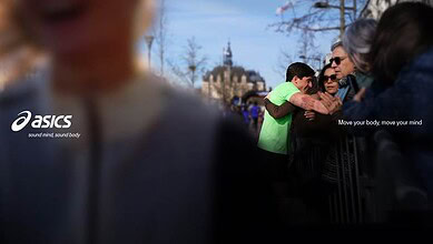 Group of runners and spectators at a running event, with a focus on community and motivation, promoting health and fitness through running.