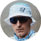 Close-up of a male runner wearing a white hat and sunglasses, preparing for outdoor run, highlighting running gear and outdoor environment.