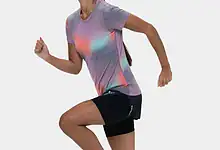 Female runner in athletic gear captured mid-stride, showcasing dynamic movement and focus, ideal for running and fitness content.