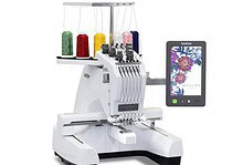 High-tech embroidery machine with multiple spools of thread and digital touchscreen interface for precise textile embroidery and design.