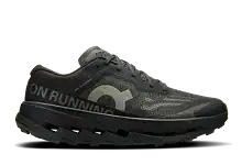 High-performance black trail running shoe with durable sole and breathable mesh, designed for runners seeking comfort and support on rugged terrains.